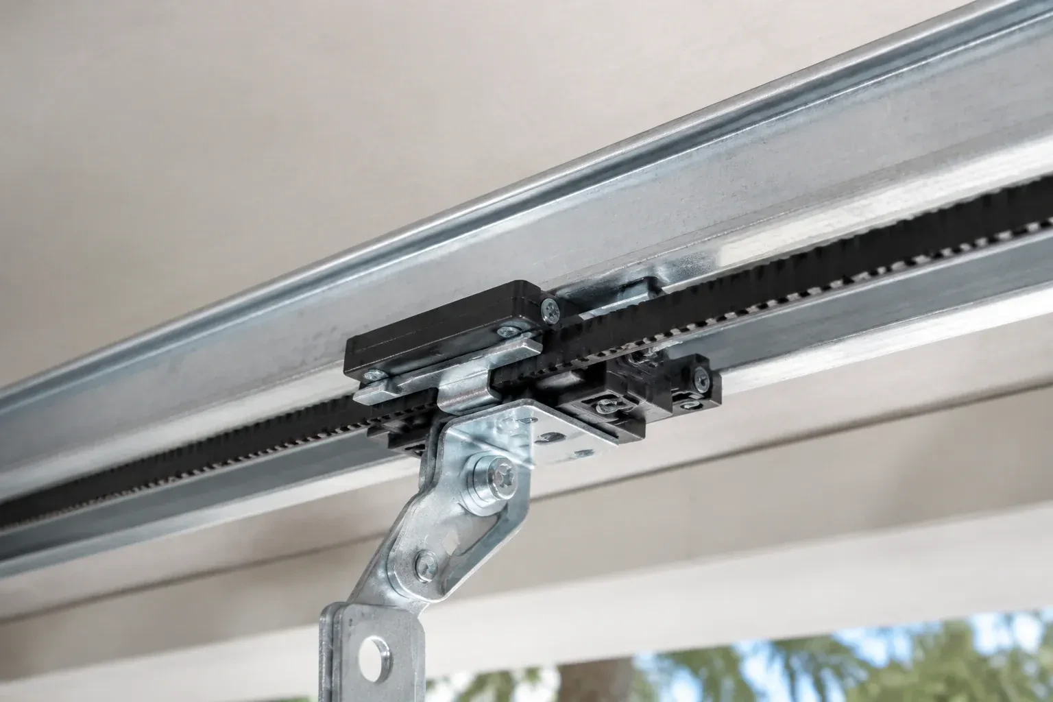 Illustrative garage doors scene; not an actual job — Belt-Drive Opener Repair, Nelles Estates